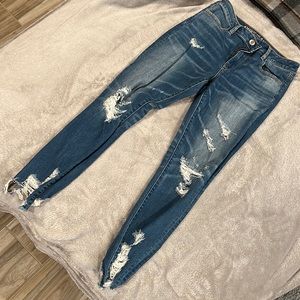 High waisted, super stretch skinny ripped jeans.